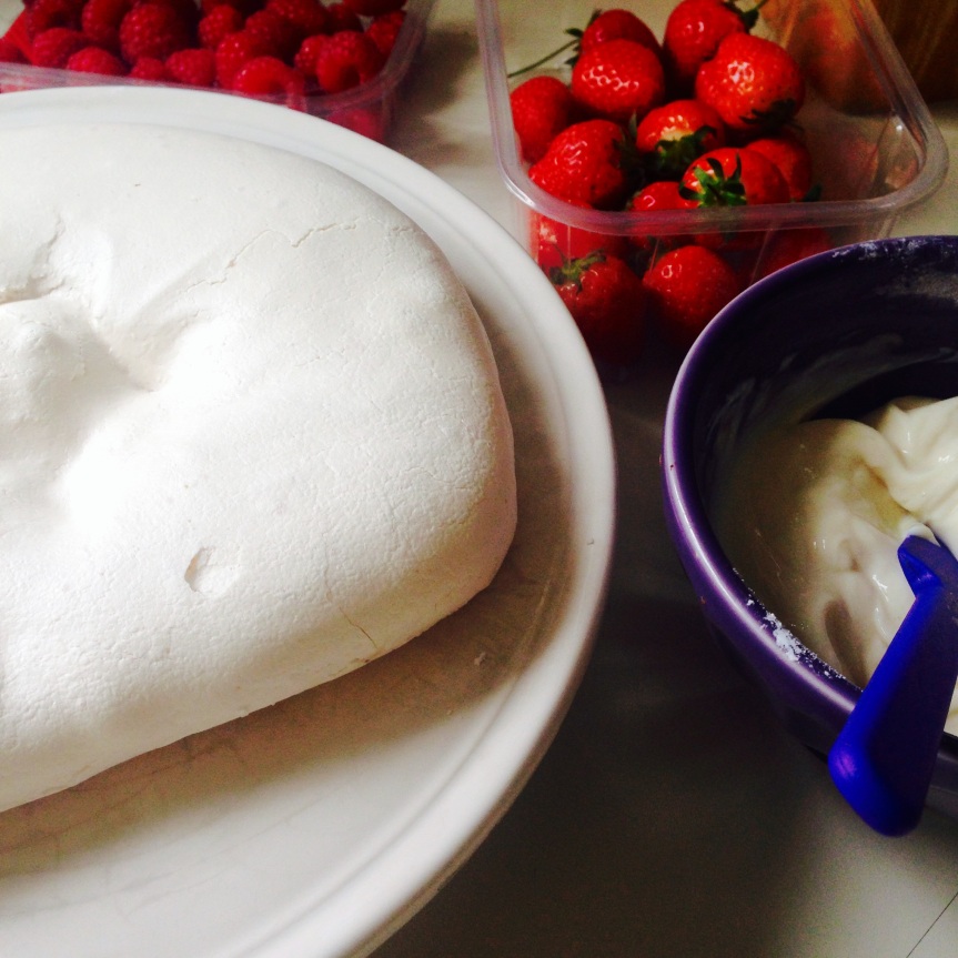 dairy-free vanilla fromage frais topping an egg-free pavlova